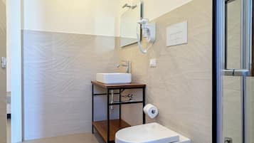 Luxury Room, Balcony | Bathroom | Shower, hair dryer, bathrobes, towels