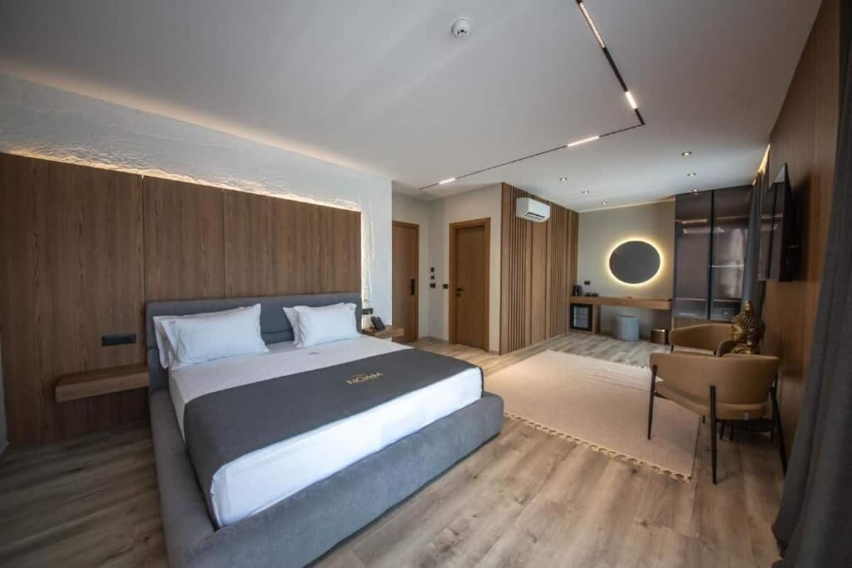 Superior Suite, Balcony, Sea View | Minibar, in-room safe, desk, blackout drapes