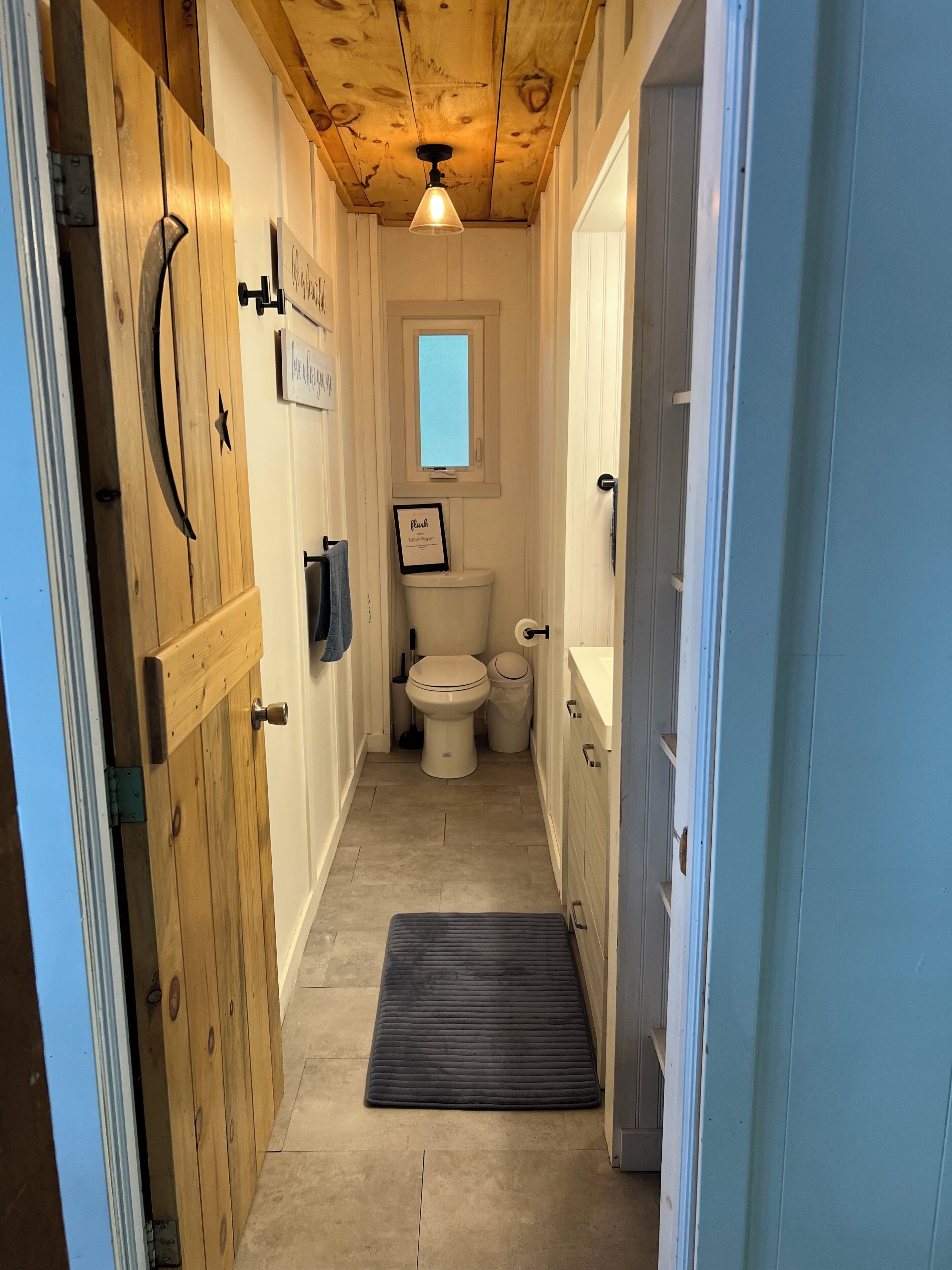 Shower, hair dryer, towels, toilet paper