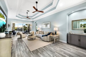 Living area - Luxury Waterfront Rental with wraparound water views at Miromar Lakes, (Miromar Lakes)