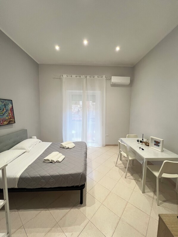 2 habitaciones, tabla de planchar con plancha y wifi gratis