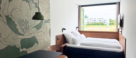 Quarto casal conforto | Roupas de cama premium, frigobar (abastecido com itens grátis)