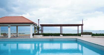 2-bedroom apartment in enchanting Portmore with WiFi, AC right on the beach side