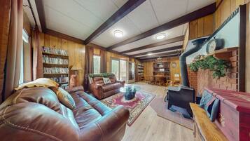 Televisión, reproductor de DVD, videoteca