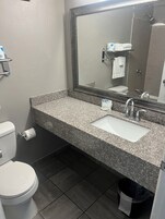 Combined shower/tub, hair dryer, towels, soap