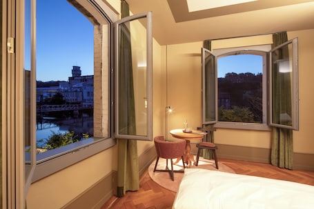 Superior Double Room, River View | Desk, laptop workspace, free WiFi, bed sheets. Aare Lodge Attisholz Self Check-in