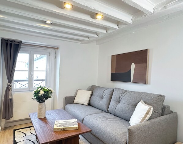 Apartment, Courtyard View | Living area | 80-cm Smart TV with digital channels