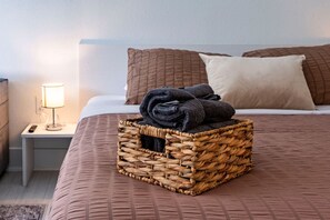 1 bedroom, desk, iron/ironing board, travel crib