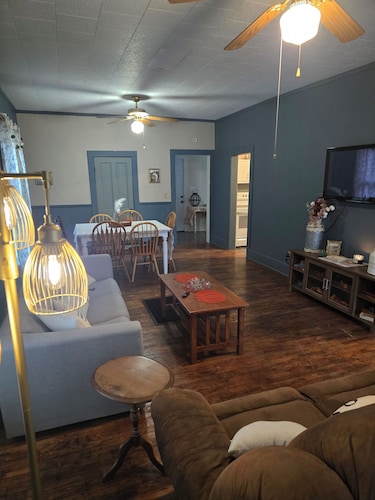 Enchanted Cottage, located in Herington, KS with 1.5 bedrooms and a shaded yard