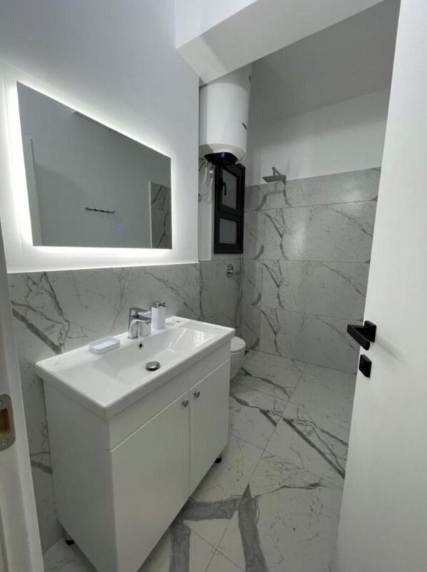 Hair dryer, towels, toilet paper