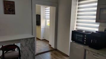 Dishwasher, coffee/tea maker, toaster, cookware/dishes/utensils