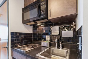Microwave, stovetop, coffee/tea maker, toaster