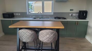 Apartment | Private kitchen | Fridge, microwave, stovetop, electric kettle