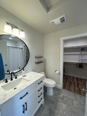 Shower, towels, soap, toilet paper