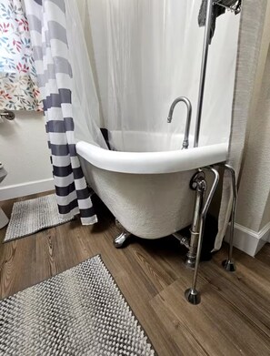 Shower, towels, soap, toilet paper