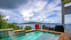 A pool with a clear view of the sea and mountains in the background. - Private Oceanfront Villa for 2 | Plunge Pool | St. John USVI (St. John)