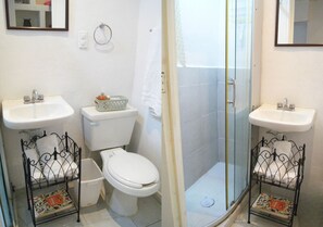 Shower, hair dryer, towels, soap