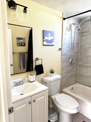 Hair dryer, towels, soap, shampoo