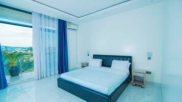 Deluxe Triple Room, Balcony, Garden View