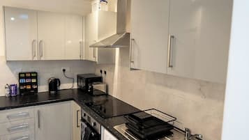 Apartment | Private kitchen | Fridge, microwave, oven, stovetop