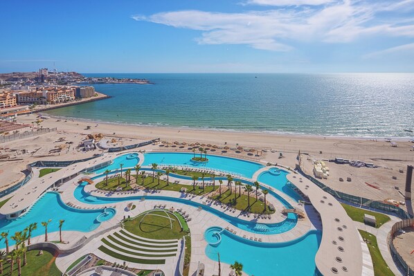 3 outdoor pools, free pool cabanas, pool umbrellas