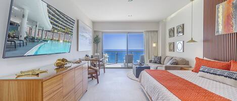 Deluxe Condo, Balcony, Ocean View | Minibar, in-room safe, blackout curtains, iron/ironing board