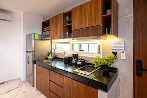 Fridge, microwave, coffee/tea maker, toaster