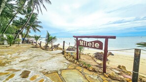 On the beach, white sand