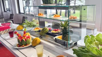 Daily buffet breakfast (USD 15.00 per person)