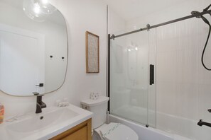 Hair dryer, towels, soap, toilet paper