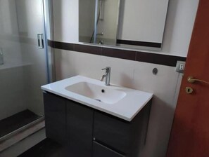 Hair dryer, towels, toilet paper