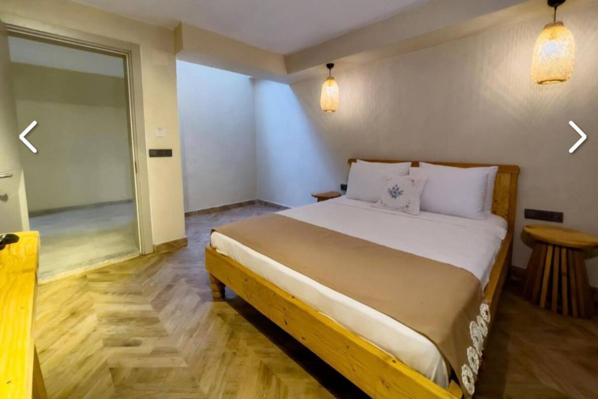 Habitación económica | Tabla de planchar con plancha y wifi gratis 