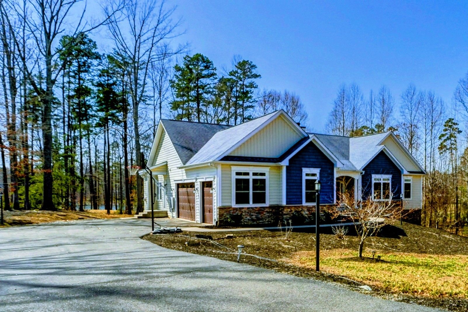 Your Lakeside Welcome – From the moment you pull in, this home invites you to slow down, settle in, and soak it all up.