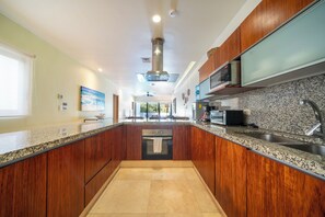 Deluxe Condo, Patio | Private kitchen | Dining tables - 2 BR Condo with Rooftop Pool - Terrazas (Playa del Carmen)