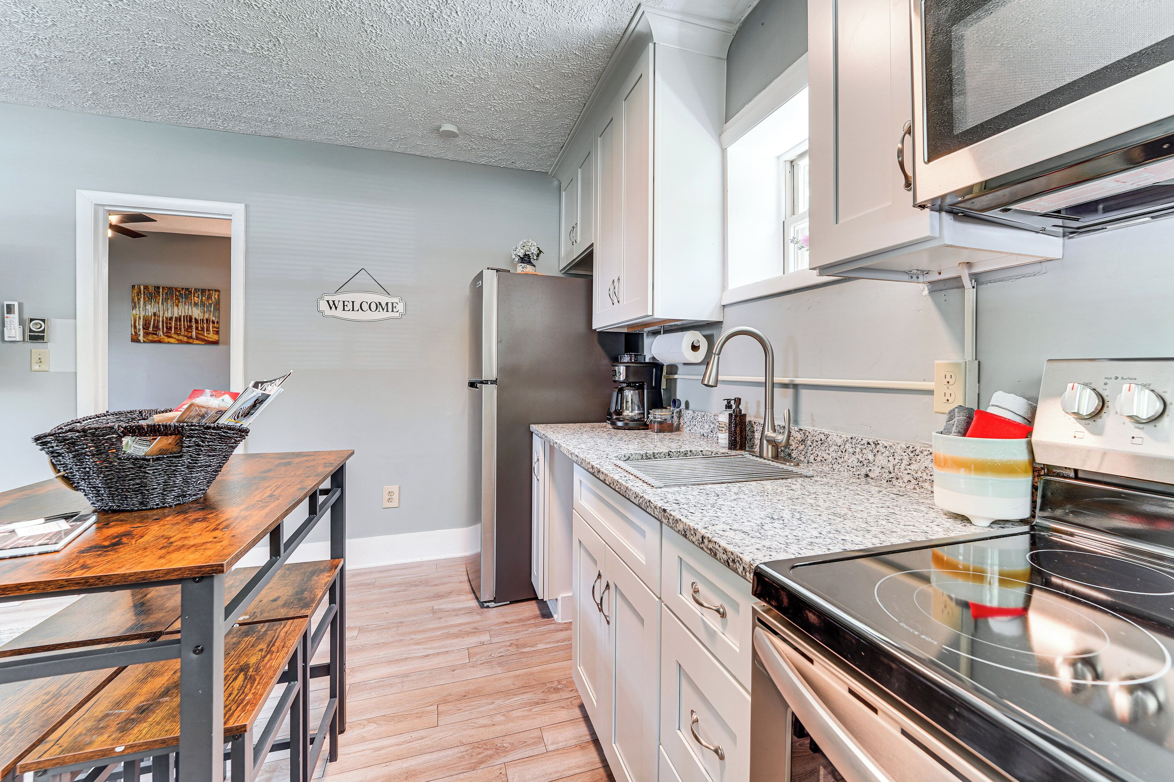 Fridge, microwave, stovetop, coffee/tea maker