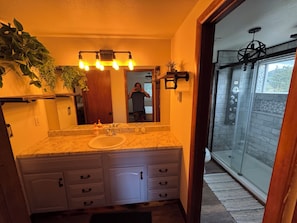 Shower, towels, soap, toilet paper