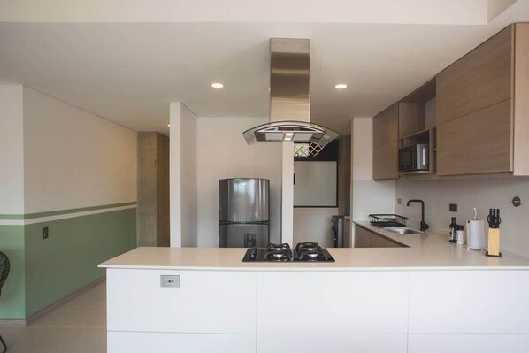 Apartment, Multiple Beds, Balcony, City View (Ekkos 902) | Private kitchen | Coffee/tea maker