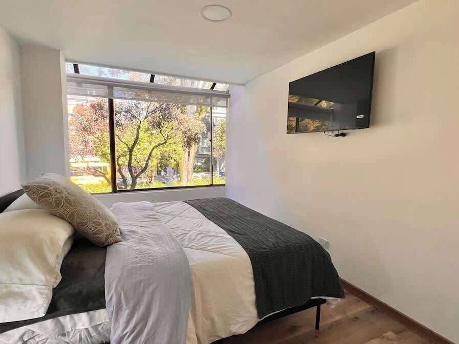 Apartment, Multiple Beds, Balcony, City View (9211 202) | 2 bedrooms, individually decorated, individually furnished, bed sheets