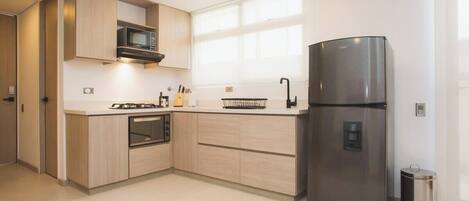 Apartment, 1 Queen Bed, Balcony, City View (Ekkos 1003) | Private kitchen | Coffee/tea maker