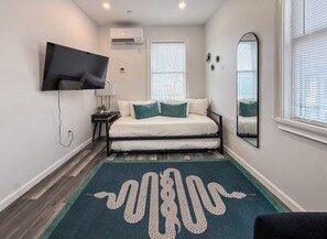 1 habitación, tabla de planchar con plancha, wifi gratis y ropa de cama 