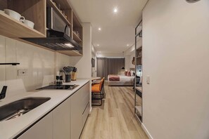 Fridge, microwave, stovetop, coffee/tea maker