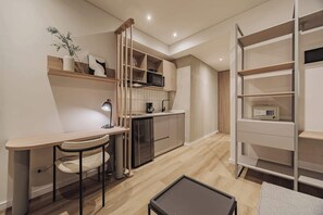 Microwave, stovetop, coffee/tea maker, cookware/dishes/utensils