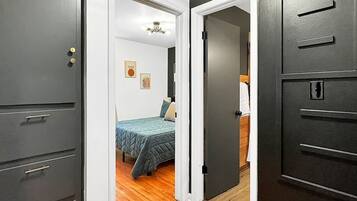 2 bedrooms, desk, iron/ironing board, travel crib