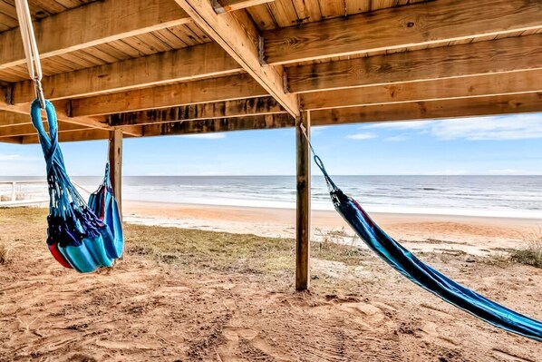 On the beach, sun-loungers