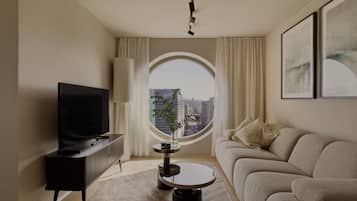 Signature Penthouse | Área de estar | Smart TV 55 polegadas com canais digitais, TV, Netflix