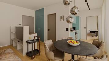 Apartment Classic | Área de sala de estar | Smart TV de 55 pulgadas con canales digitales, televisión y Netflix