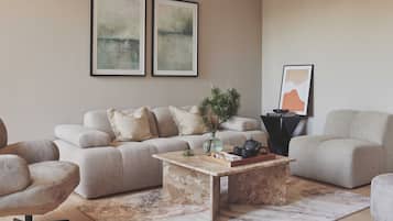 Comfort Apartment | Living area | 55-inch Smart TV with digital channels, TV, Netflix
