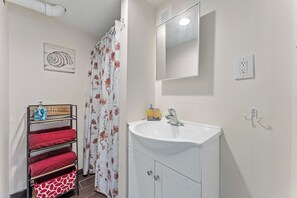 Shower, towels, soap, toilet paper