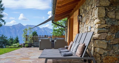 Chalet de luxe Larice avec vue sur les montagnes et terrasse panoramique