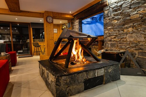 Treat yourselves to a luxury half-board ski-in chalet getaway!